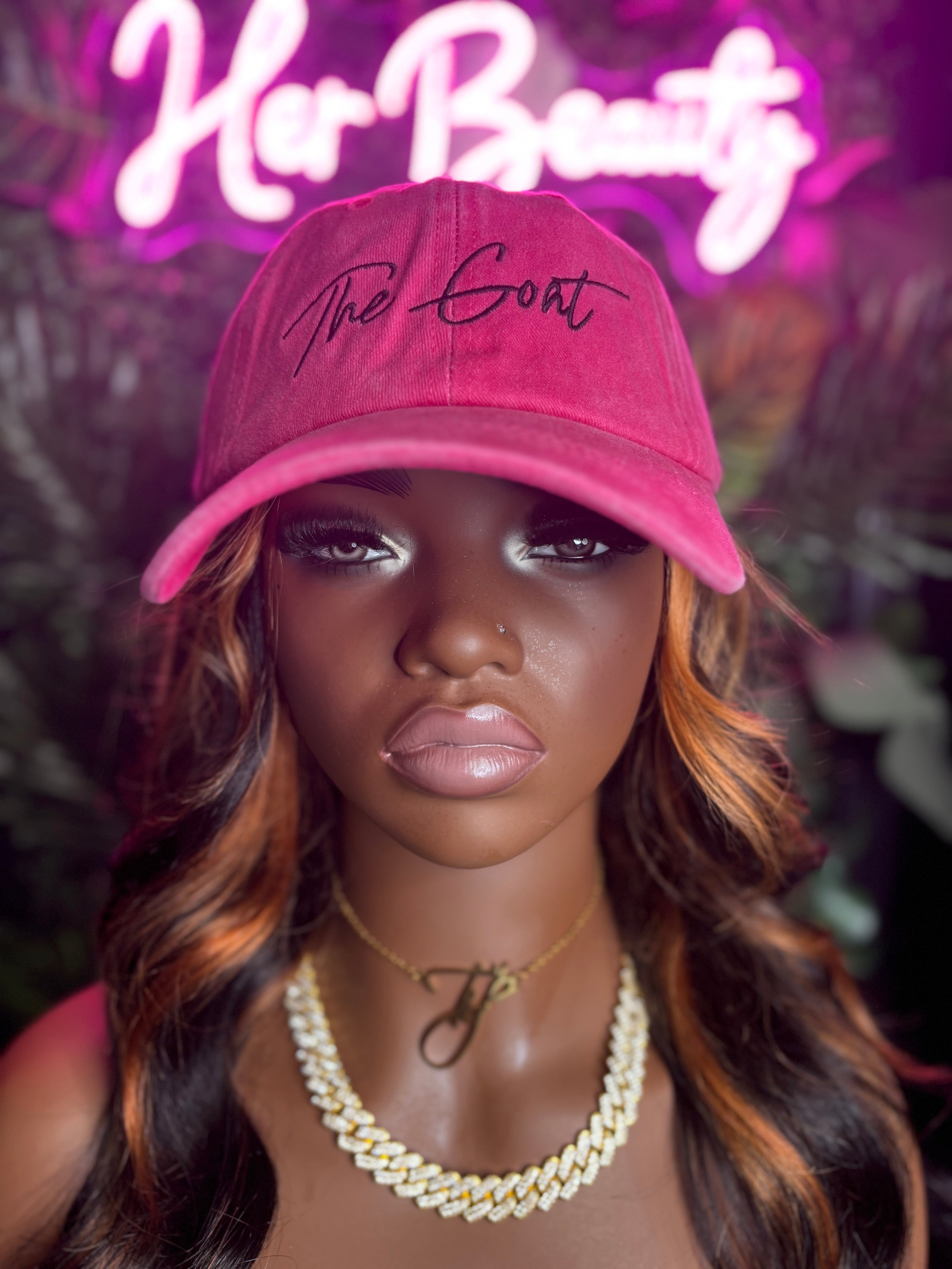 The Goat Her Cap