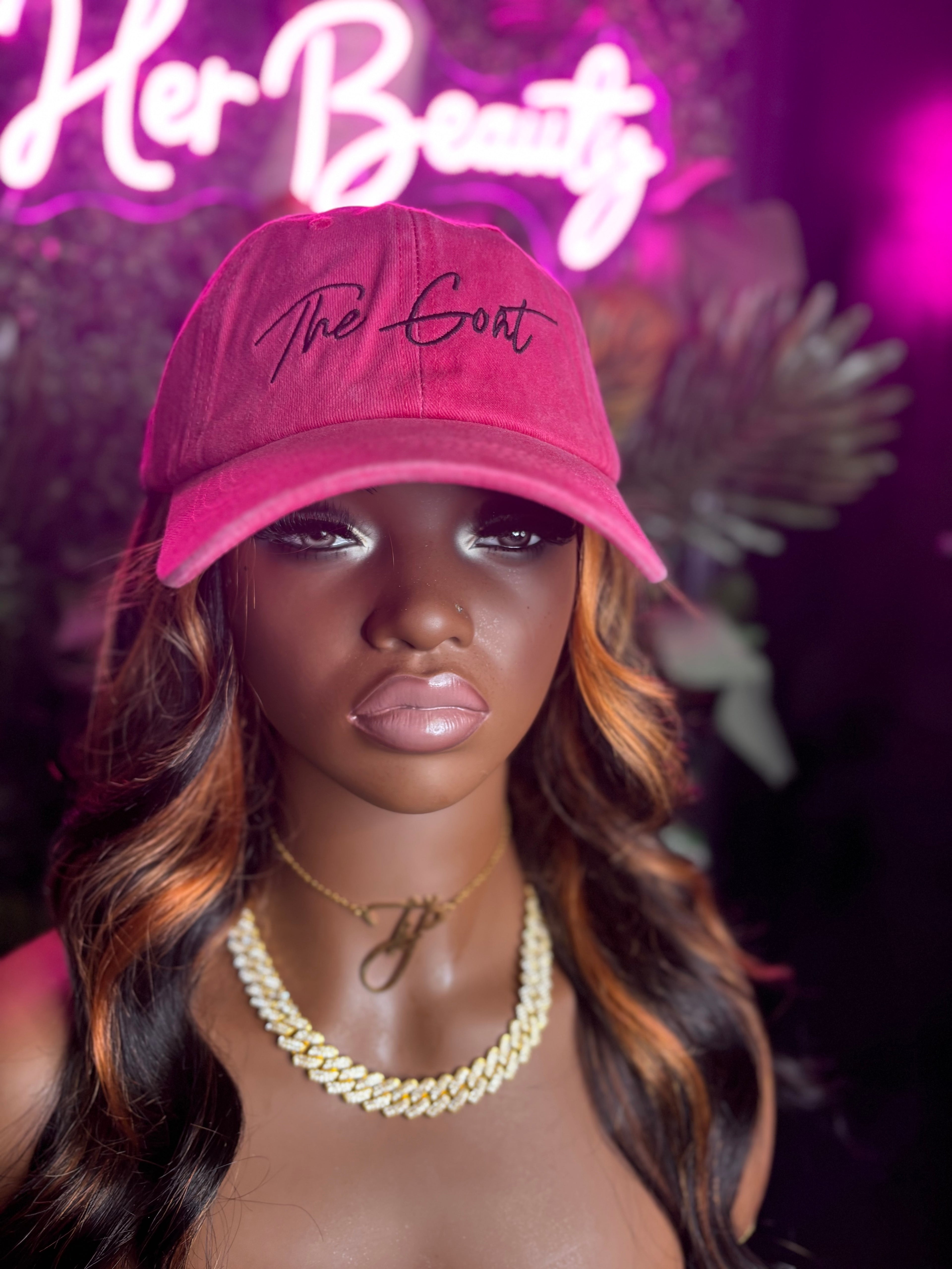 The Goat Her Cap